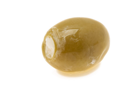 green pickled olives with cheese isolated on white backgroundの写真素材