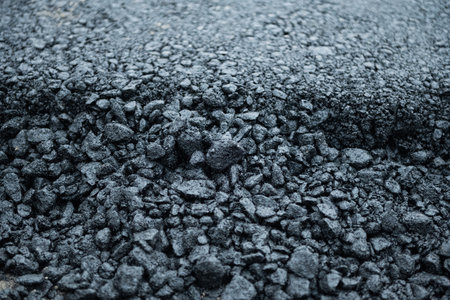 repair of an asphalt road with fresh asphalt