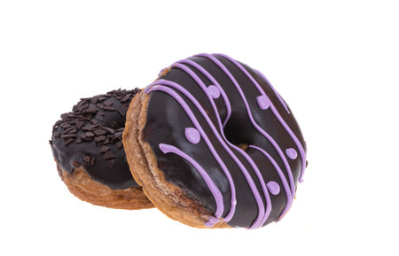 donuts in glaze isolated on white backgroundの写真素材