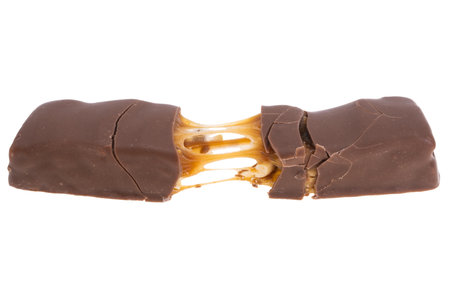 chocolate bar with nuts isolated on white backgroundの写真素材