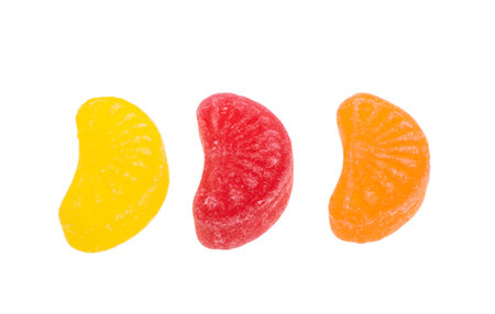 fruit lollipops isolated on white backgroundの写真素材