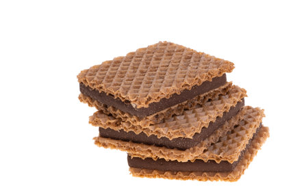 square chocolate wafers isolated on white backgroundの写真素材