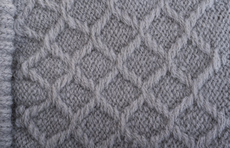 gray background from knitted texture macroの写真素材