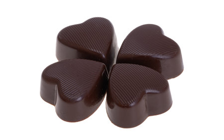 chocolate candy heart isolated on white backgroundの写真素材