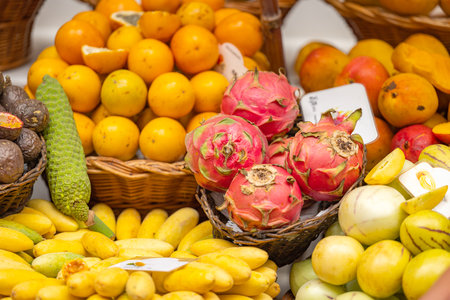 exotic fruits on the market in Funchalの写真素材