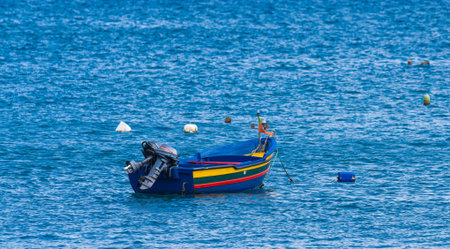 fishing boats in the oceanの写真素材