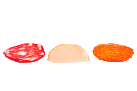 sliced sausage isolated on white backgroundの写真素材