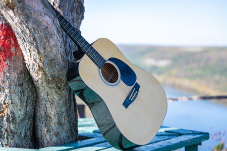 guitar in nature on a sunny day in autumnの写真素材