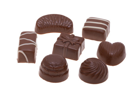 chocolate candies isolated on white backgroundの写真素材