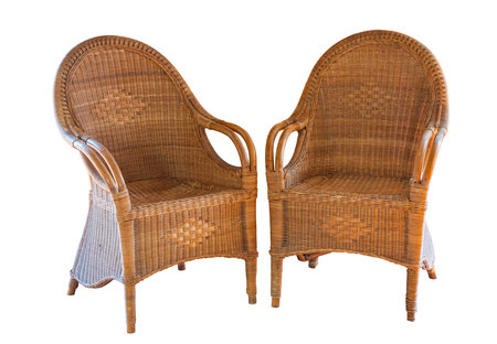 two wicker chairs isolated on white backgroundの写真素材