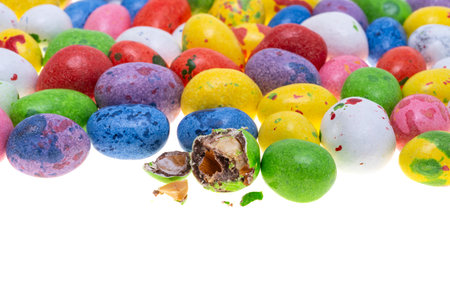 colored dragee with nut isolated on white background