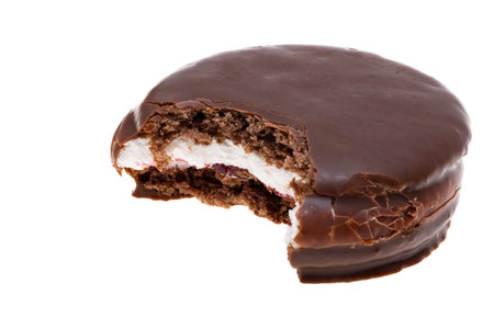chocolate biscuit sandwich in chocolate glaze isolated on white backgroundの写真素材