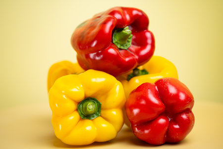 bell pepper on a yellow backgroundの写真素材