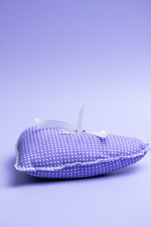 dried lavender in bags on a beautiful lilac backgroundの写真素材