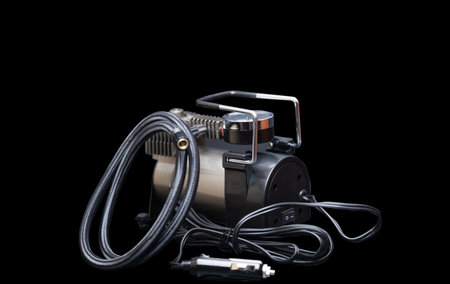 car tire compressor on black backgroundの写真素材