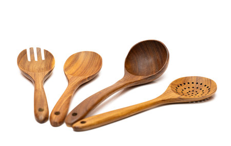 wooden kitchen spatulas on white backgroundの写真素材