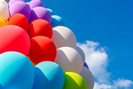 many colorful balloons close upの写真素材