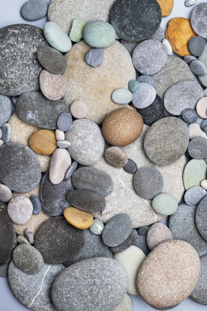 background of sea pebbles close upの写真素材