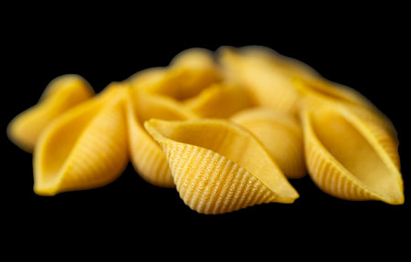 colored pasta shells close upの写真素材