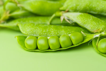 green peas on a light green background