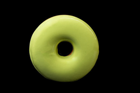 glazed donuts isolated on black background
