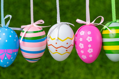 Easter egg close-up on a green background