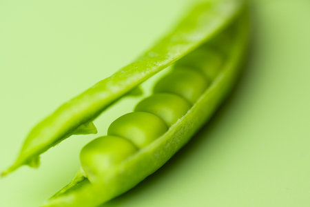 A close-up photo of fresh green peas