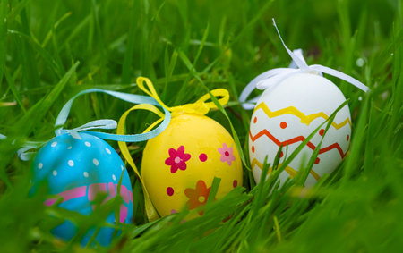 Easter egg in green grass close-up