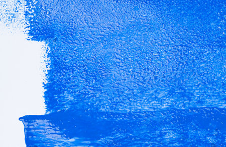 Painting blue with a roller