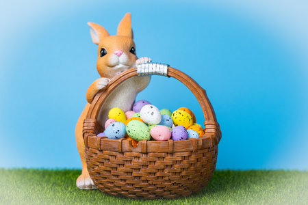 beautiful Easter decoration of bunnies on green grass
