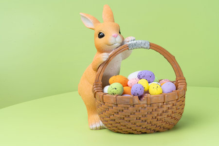 Easter photo with a bunny and eggs on a background