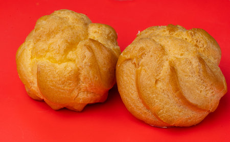 Close-up of airy choux pastry with cream