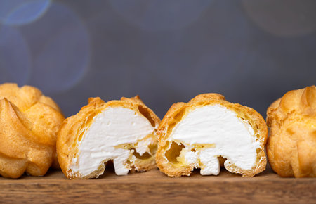 Close-up of airy choux pastry with cream