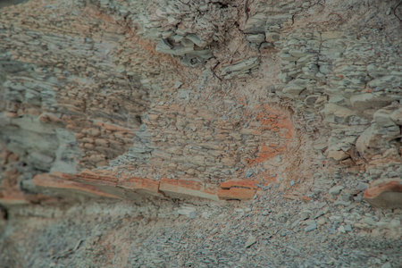 Close-up of the surface of an old rock formation. Natural background.
