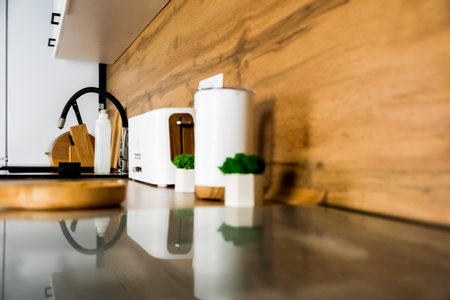 Kitchen appliances on a wooden white background of a modern kitchen. High quality photoの写真素材