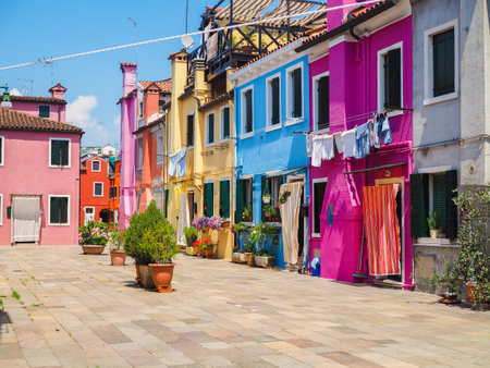 Venice landmark, Burano island canal, colorful houses and boats, Italy Europeの写真素材