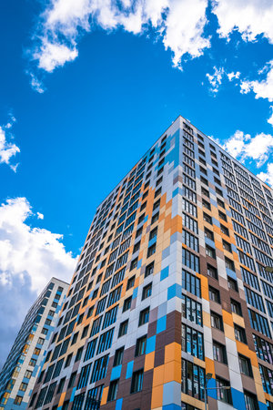 Multi-storey residential modern house against the sky. Residential area.の写真素材