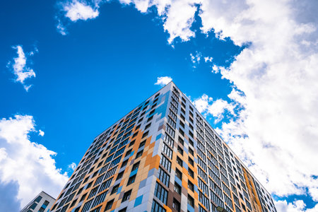 Multi-storey residential modern house against the sky. Residential area.の写真素材