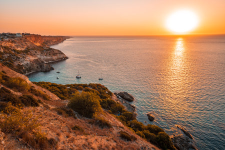 Sunset on Cape Fiolent, panorama of the black sea with azure water, Crimeaの写真素材