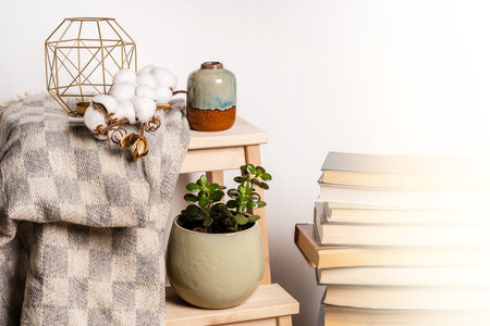 : Still life home atmosphere in the interior with books and candles, home decor elements, comfort comfort, autumn winter seasonal weekend relaxation, stay at home self-isolationの写真素材