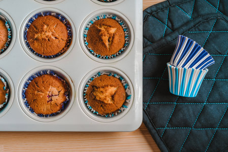 Freshly baked muffins in the form, photo from above