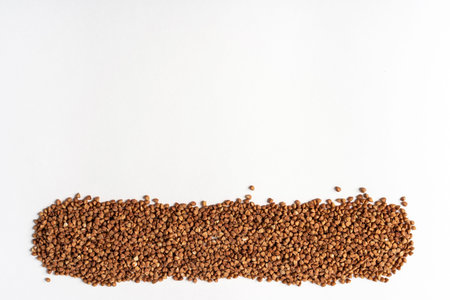 Buckwheat isolated on a white background, buckwheat textureの写真素材