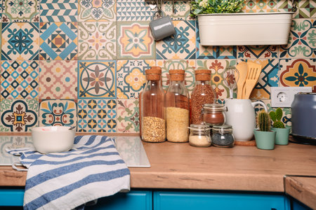 Top view of kitchen colored tiles with lots of cozy details and accessories, toaster. Modern style and interiorの写真素材