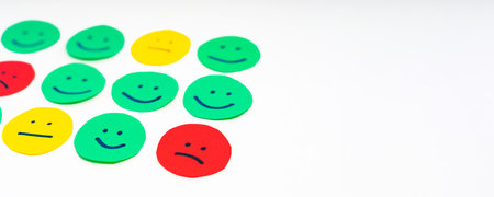 Paper-cut circles with faces with different emotions. A group of facial expressions for high-quality, high-mood eyesの写真素材