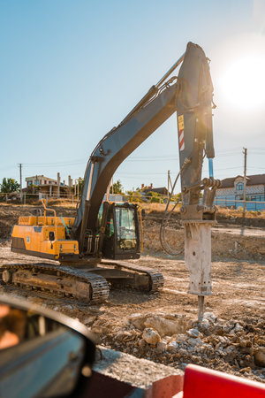 Industrial drilling rig machinery on highway construction site. Construction equipment, special equipment for the construction of roads. Crimea, Russiaの写真素材