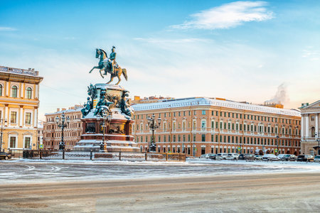 View of the monument to Nicholas I and St. Isaac's Cathedral on a snowy winter day in St. Petersburg. Postcard tourist viewのeditorial素材
