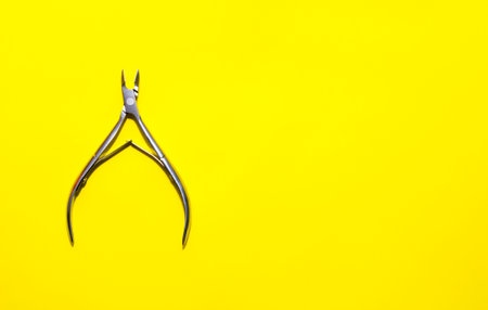 Manicure set on a yellow background.の写真素材