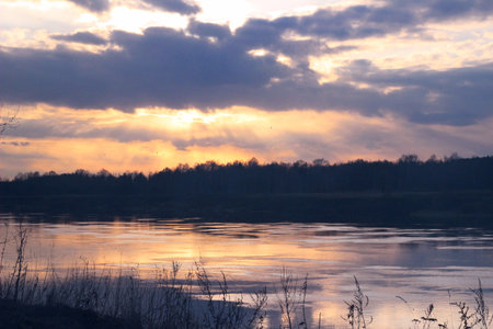 sunset over the riverの写真素材