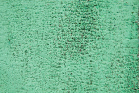 Old wooden boards painted green paintの写真素材