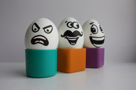 Eggs with a cute face. Photo for your design. Concept: all besyat